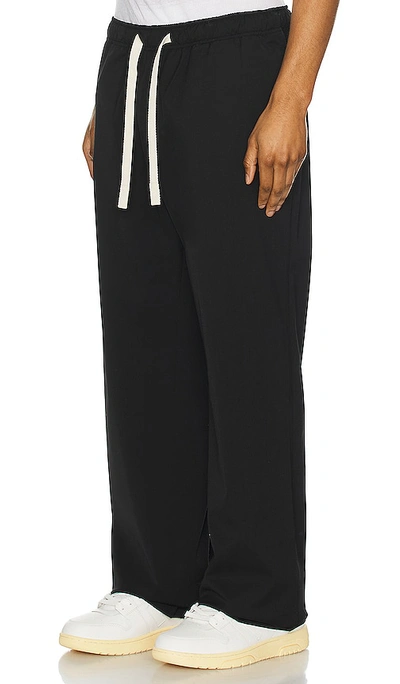 Shop Palm Angels Monogram Travel Pants In Black