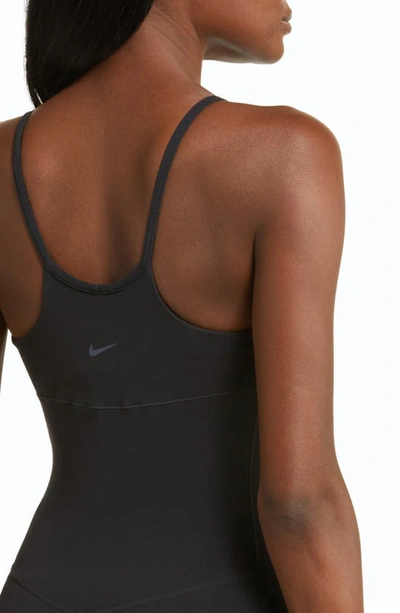 Shop Nike Dri-fit Jumpsuit In Black/ Pcg6c