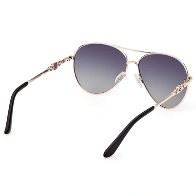 Shop Guess Sunglasses In Gold
