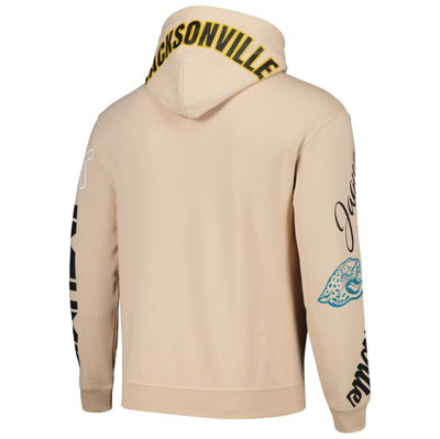 Shop The Wild Collective Unisex   Cream Jacksonville Jaguars Heavy Block Pullover Hoodie In Natural