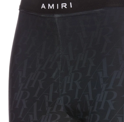 Shop Amiri Trousers In Black