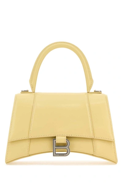 Shop Balenciaga Handbags. In Yellow