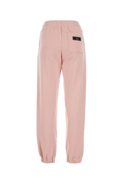 Shop Versace Pants In Pink