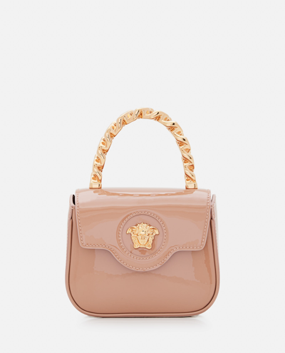 Shop Versace La Medusa Patent Leather Mini Bag In Beige