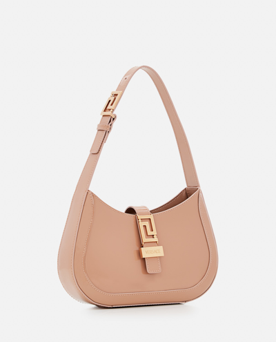 Shop Versace Patent Leather Shoulder Bag In Beige