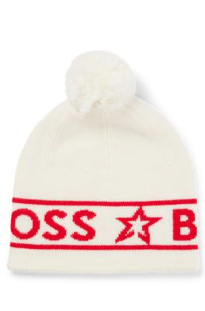 Shop Hugo Boss Boss X Perfect Moment Wool Beanie Hat With Logo Intarsia In White