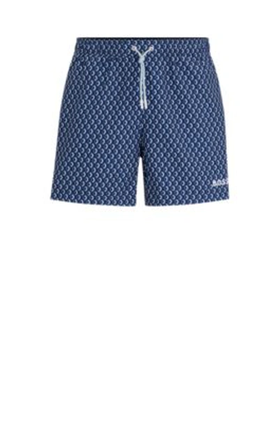 Shop Hugo Boss Micro-print Quick-drying Swim Shorts With Logo Detail In Dark Blue