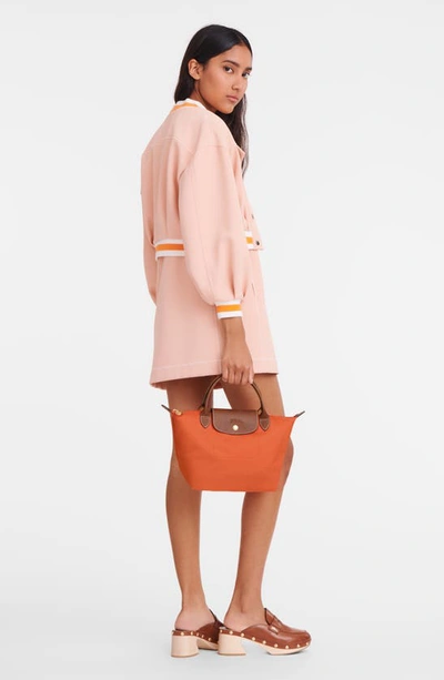 Shop Longchamp 'mini Le Pliage' Handbag In Orange/ Orange