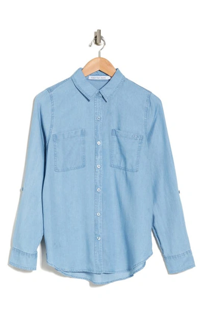 Shop Calvin Klein Jeans Est.1978 Roll Tab Long Sleeve Button-up Shirt In Chambray