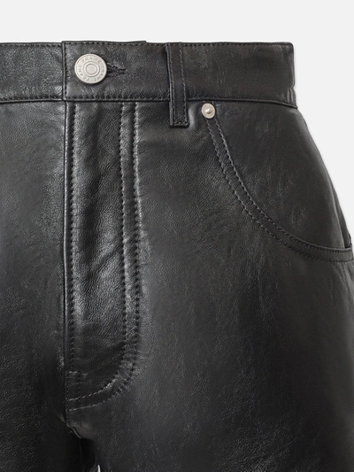 Shop Frame Side Slit Leather Shorts In Black