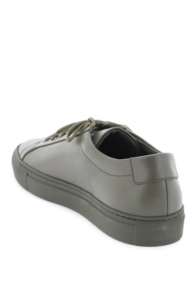 Shop Common Projects Original Achilles Low Sneakers Men In Yellow