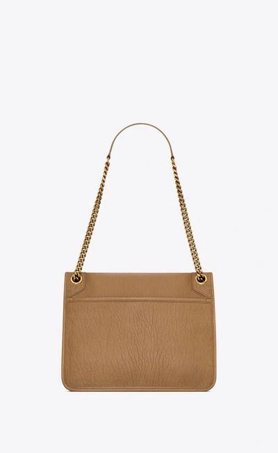 Shop Saint Laurent Women Medium Niki Leather Shoulder Bag In Brown