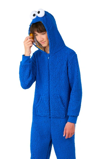 Shop Opposuits Kids' Sesame Street® Cookie Monster Jumpsuit In Blue