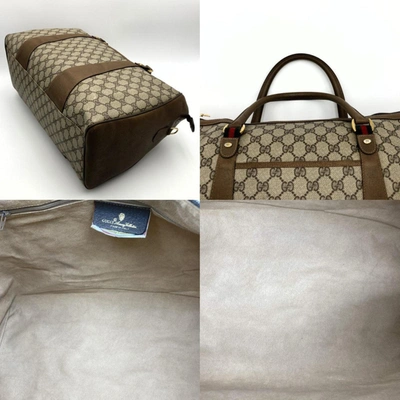 Shop Gucci Gg Supreme Brown Canvas Travel Bag ()