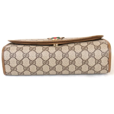Shop Gucci Sherry Brown Leather Clutch Bag ()
