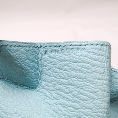 Shop Hermes Hermès 24 Blue Leather Wallet  ()