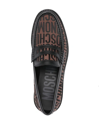 Shop Moschino Flat Shoes In Brown