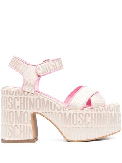 Shop Moschino Sandals In Pink/beige