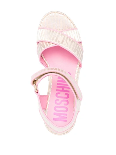 Shop Moschino Sandals In Pink/beige