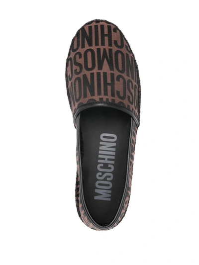 Shop Moschino Sandals In Brown