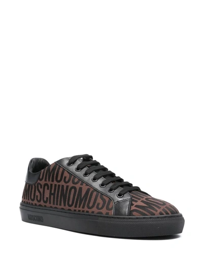 Shop Moschino Sneakers In Brown