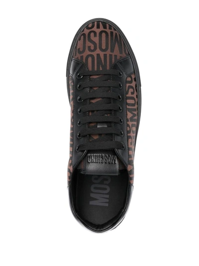 Shop Moschino Sneakers In Brown