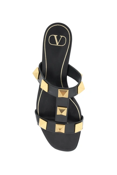 Shop Valentino Garavani Roman Stud Slides Women In Black