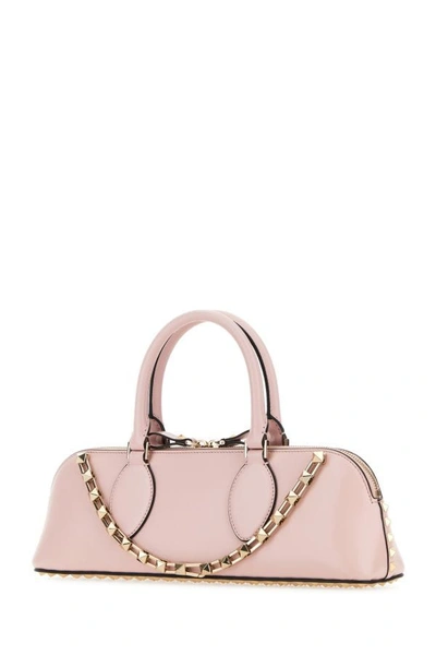 Shop Valentino Garavani Woman Pastel Pink Leather Rockstud East-west Handbag