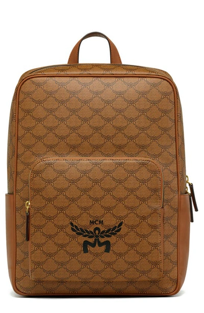 Shop Mcm Lauretos Coated Canvas Backpack In Cognac