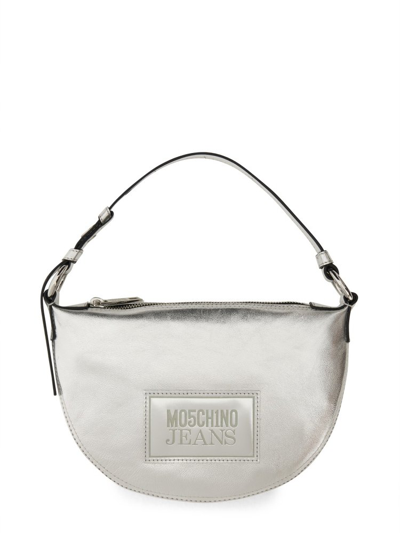 Shop Moschino Jeans Logo Patch Metallic Effect Shoulder Bag In Silver
