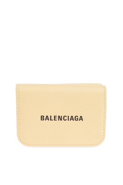 Shop Balenciaga Cash Mini Wallet In Yellow