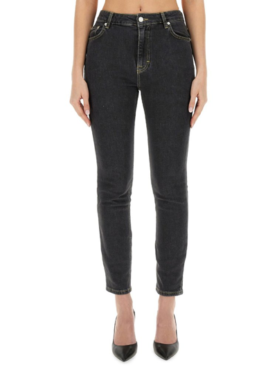 Shop Moschino Jeans Logo Patch Skinny Fit Jeans In Black