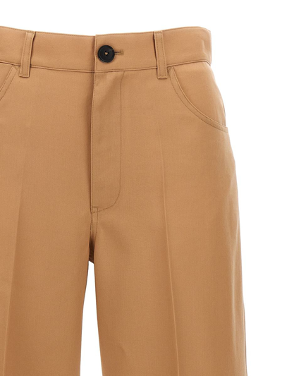 Shop Jil Sander Loose Leg Pants In Beige