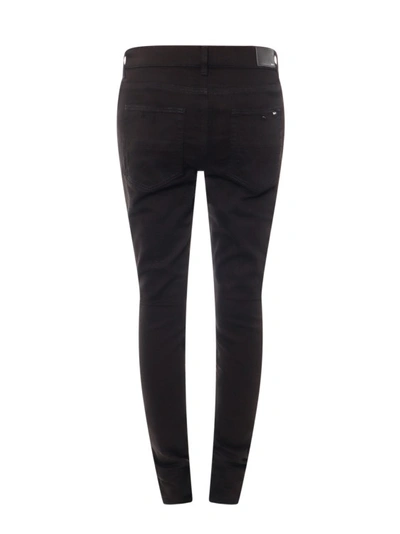Shop Amiri Stretch Cotton Jeans With Used Effect In Black