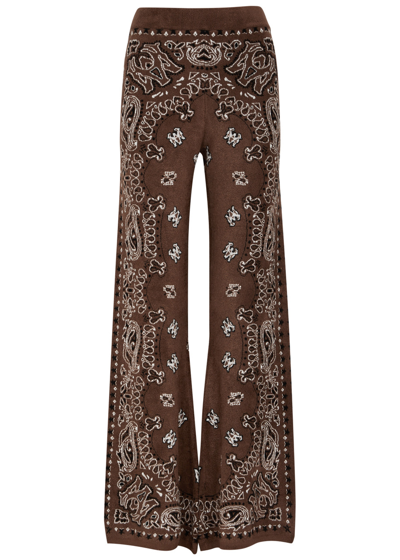 Shop Amiri Bandana-intarsia Flared Knitted Trousers In Brown