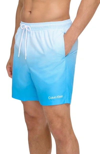 Shop Calvin Klein Core Volley Gradient Stripe Swim Trunks In Light Blue