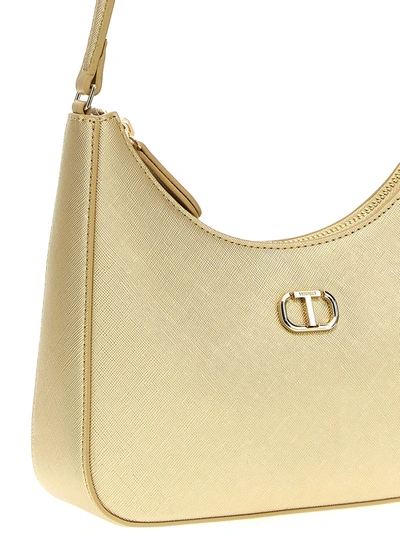 Shop Twinset Hobo Oval T Shoulder Bags Gold