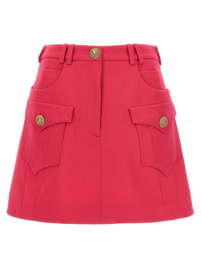 Shop Balmain Logo Button Mini Skirt In Fuchsia