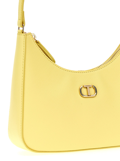 Shop Twinset Hobo Oval T Shoulder Bag In Yellow
