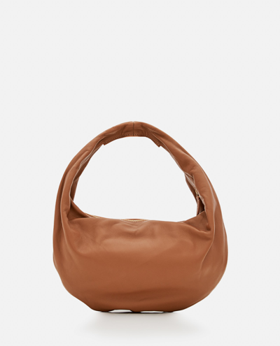 Shop Khaite Olivia Medium Leather Hobo Bag In Beige