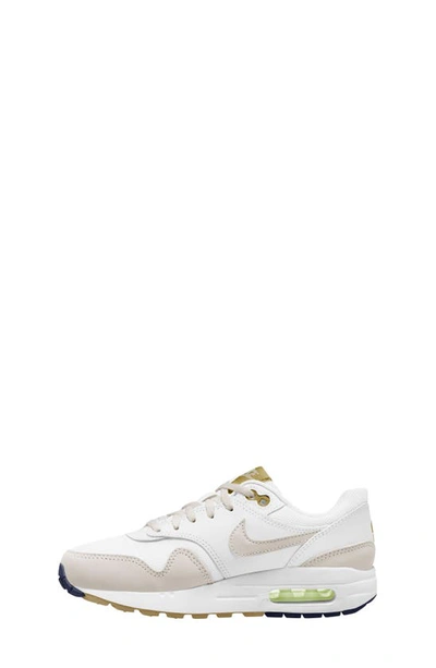 Shop Nike Kids' Air Max 1 Sneaker In White/ Light Orewood/ Bronzine