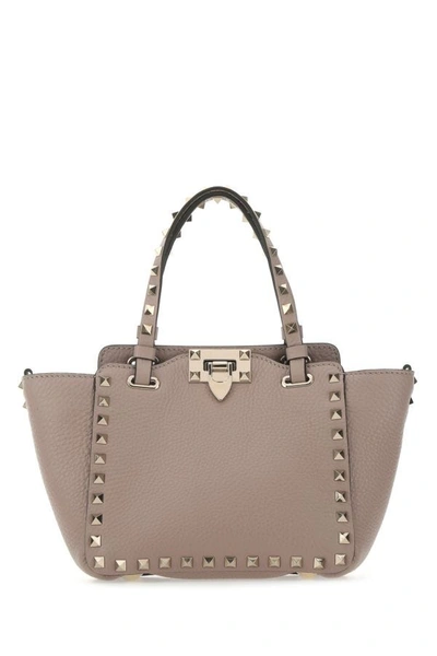 Shop Valentino Garavani Woman Antiqued Pink Leather Mini Rockstud Handbag