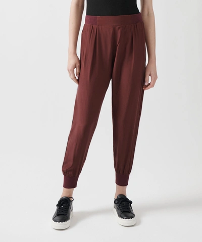 Shop Atm Anthony Thomas Melillo Silk Charmeuse Frayed Trim Joggers In Cordovan
