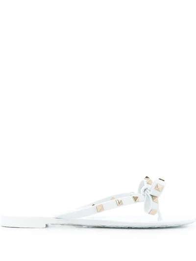 Shop Valentino Garavani Rockstud Rubber Thong Sandals In White