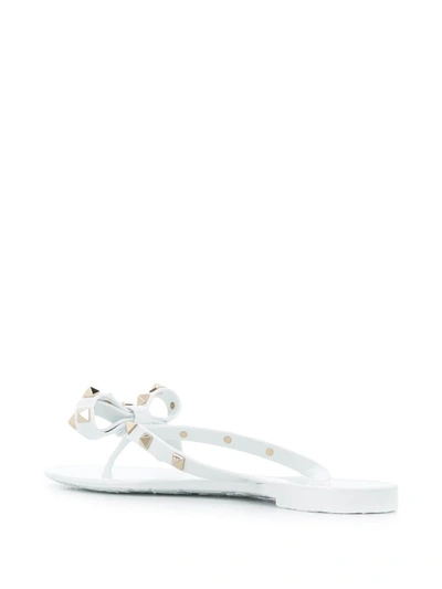 Shop Valentino Garavani Rockstud Rubber Thong Sandals In White