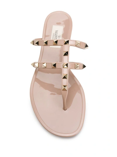 Shop Valentino Garavani Rockstud Rubber Thong Sandals In Powder