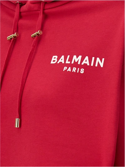 Shop Balmain Flocked Logo Cropped Hoodie In Fuchsia