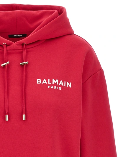 Shop Balmain Flocked Logo Cropped Hoodie Sweatshirt Fuchsia