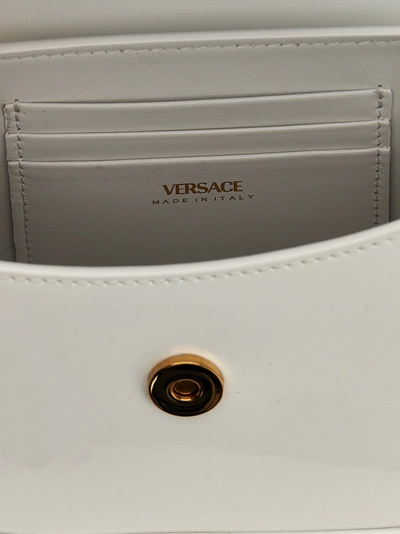 Shop Versace La Medusa Hand Bags White
