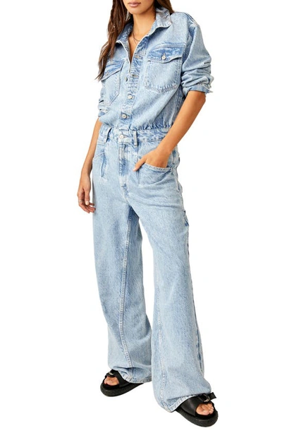 Shop Free People Touch The Sky Long Sleeve Denim Jumpsuit In Cloud 9